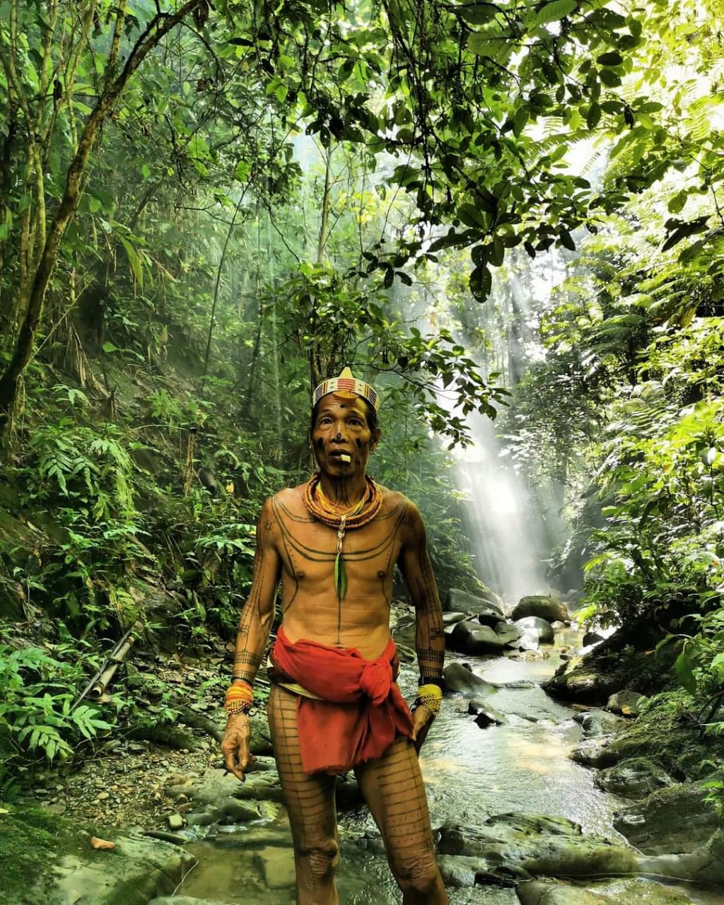 Sikerei shaman leading traditional trance dance ceremony