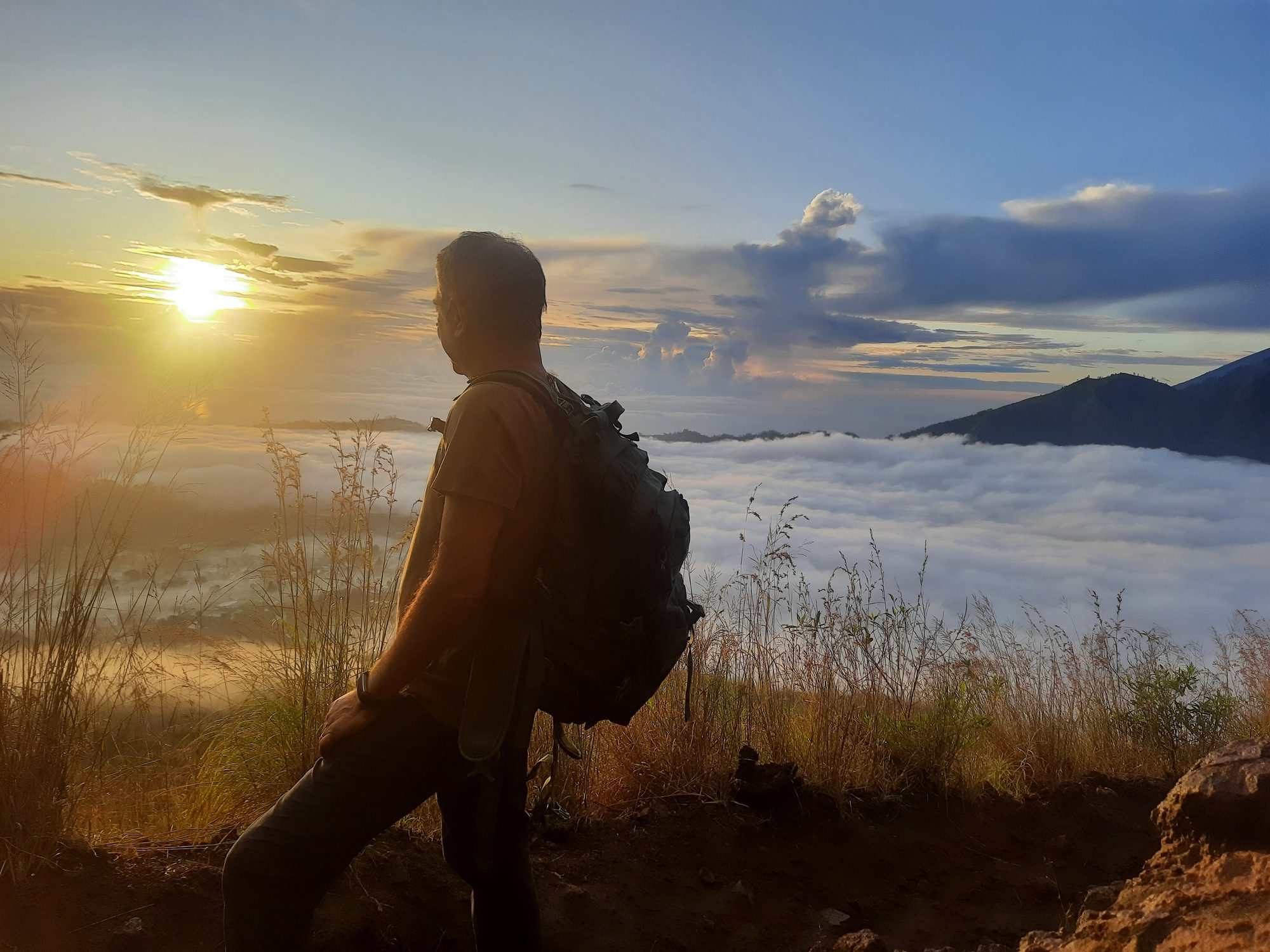 Tranquil Bali sunrise over misty lakes